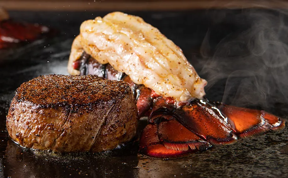 Longhorn menu of Flo's Filet & Lobster Tail with price and image